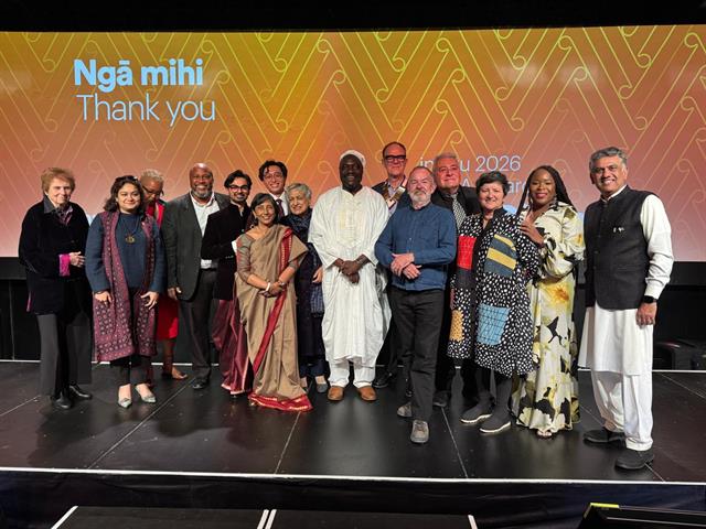 Delegates on stage at the closing session of CAA Auckland 2026