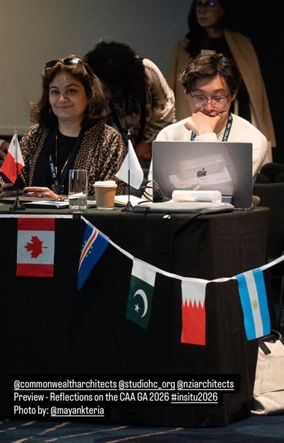 A session desk at CAA Auckland 2026 with Commonwealth flags