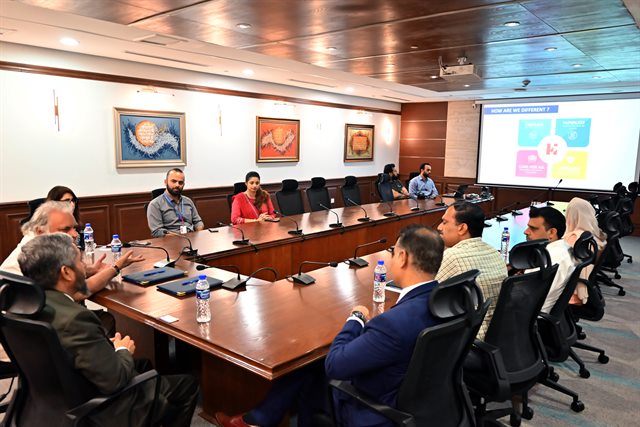 A briefing on the hospital network given to the visiting delegation in the boardroom
