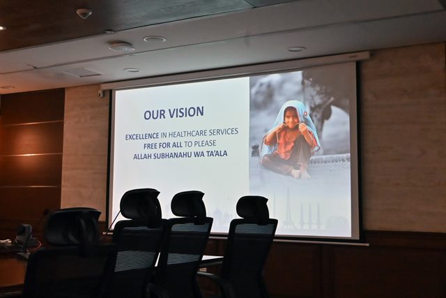 A slide from the briefing setting out the hospital network's vision of excellence in healthcare services free for all