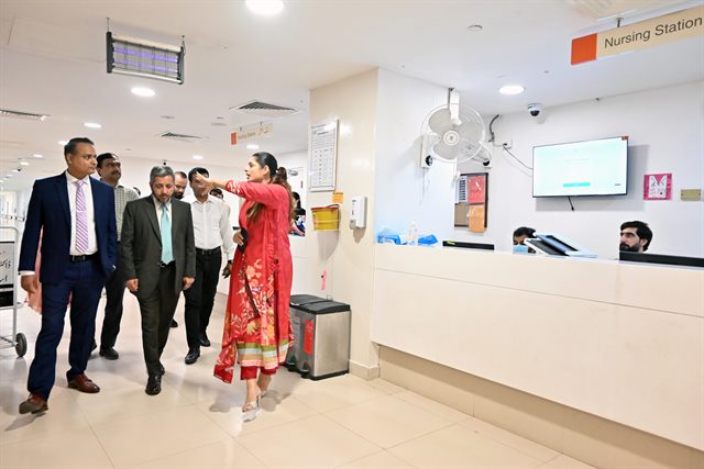 The delegation being shown the nursing station during the tour