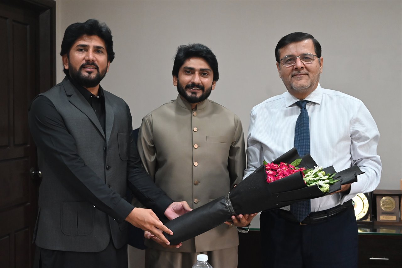 A bouquet presented to the Director in his office