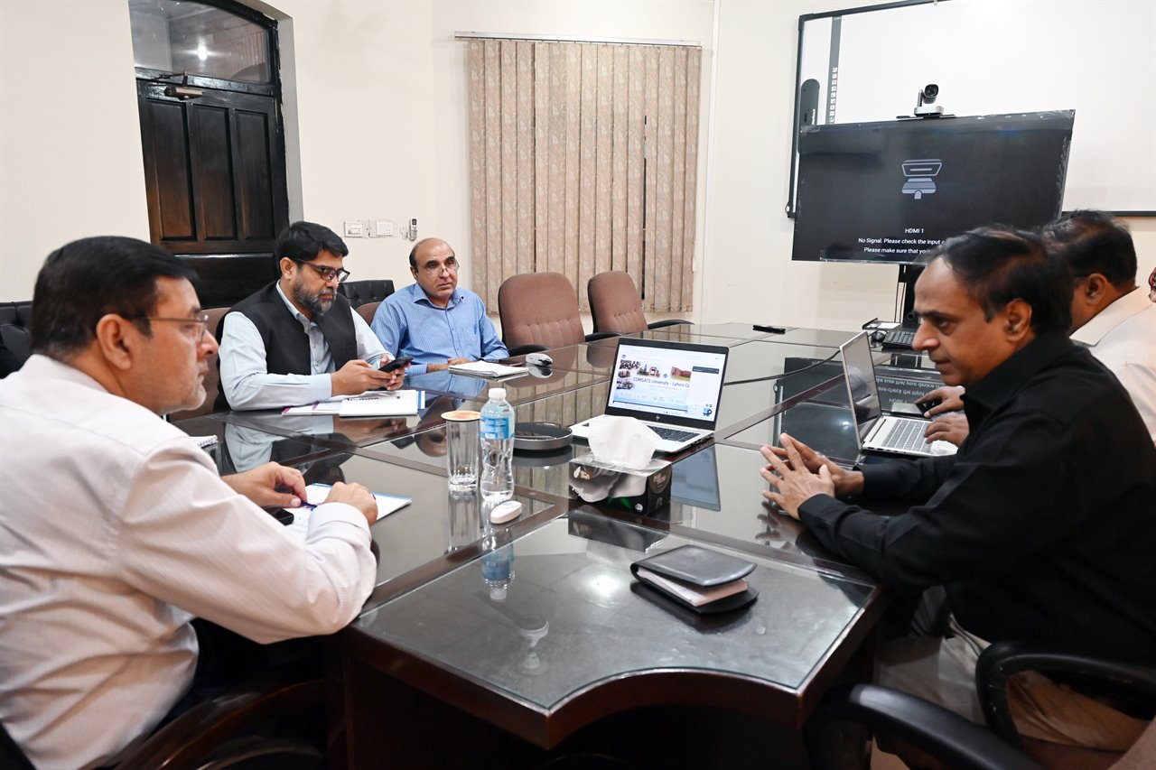 A working session with laptops and papers