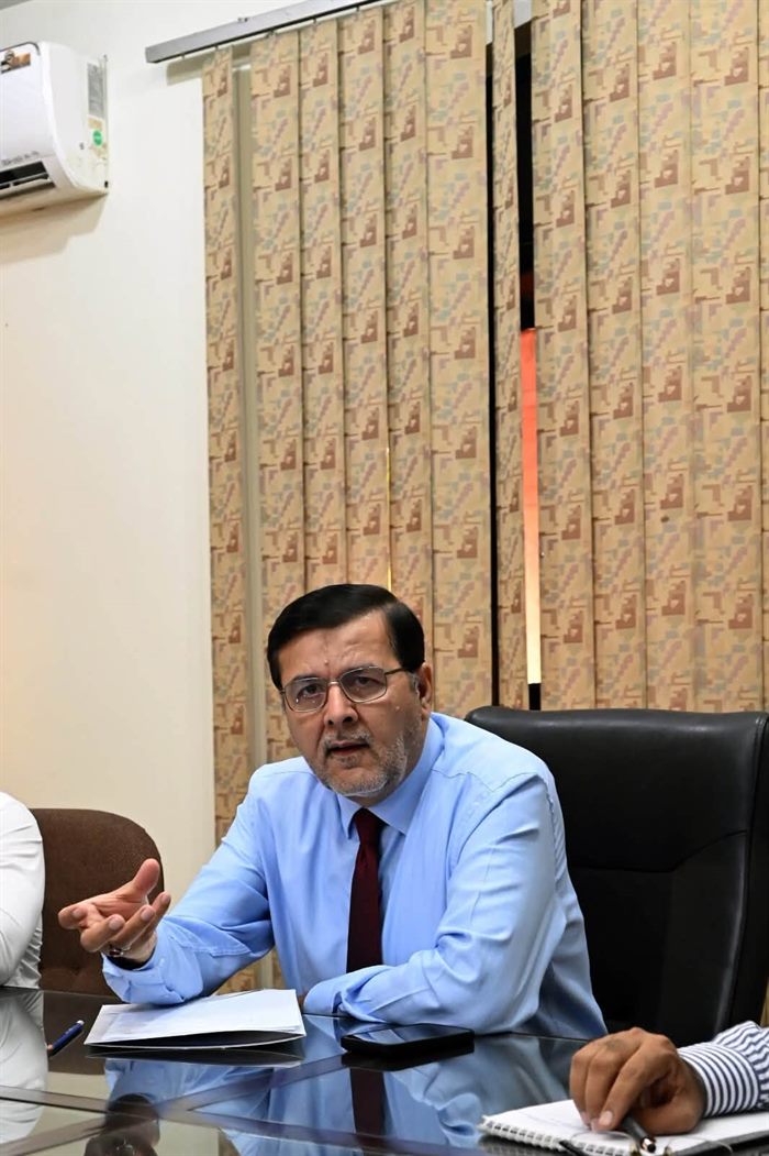 The Director speaking during one of the day's meetings