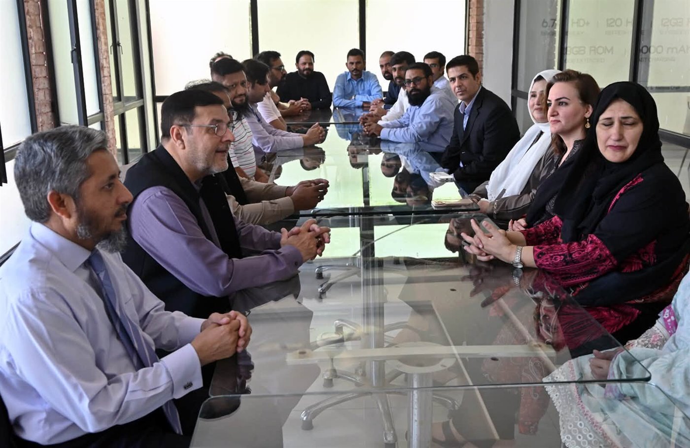 The Campus Director reviewing IT operations with the Information Technology Services team
