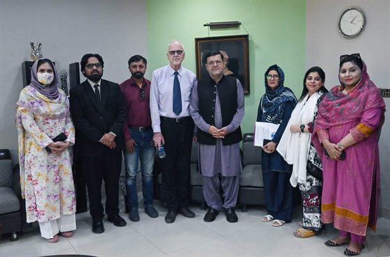 The Campus Director with a visitor and colleagues at the Director Secretariat