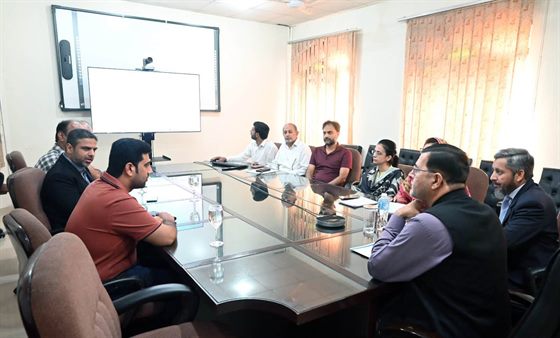 The Campus Director with colleagues in the campus boardroom