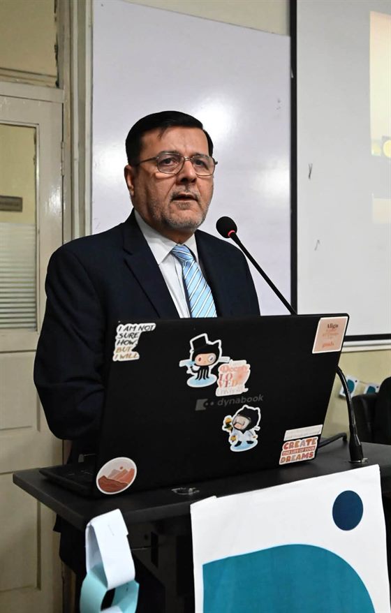 A speaker at the podium during the seminar