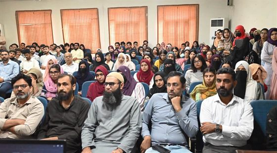 Students and faculty listening to the seminar