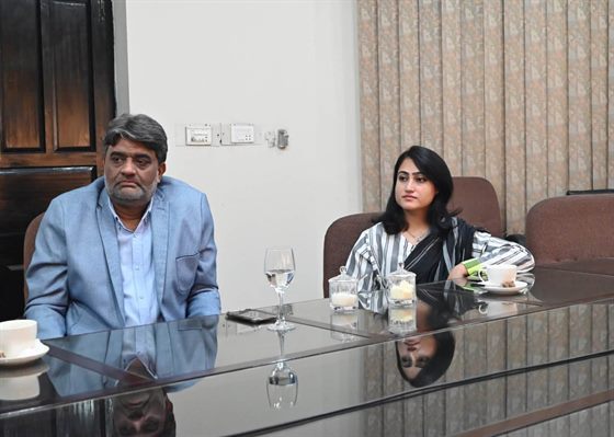 Faculty members at the boardroom meeting