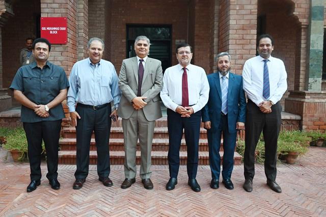 Prof. Dr. Qaisar Abbas with faculty members outside the Gul Muhammad Shah Block