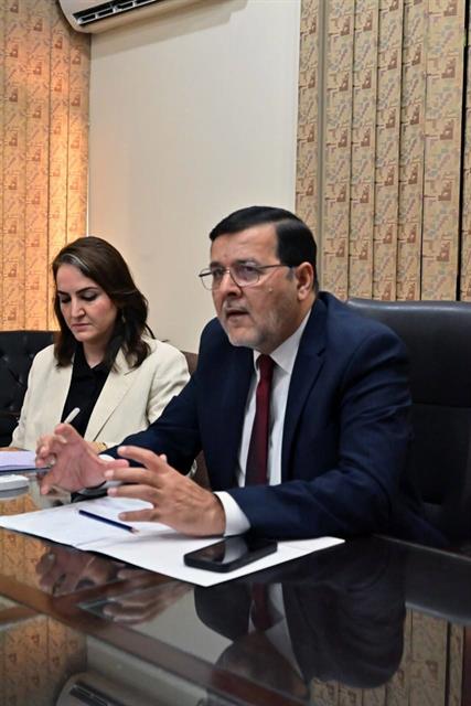 The Director speaking during an introductory meeting with a department