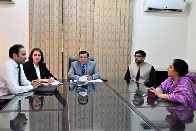 A department team meeting with the Director
