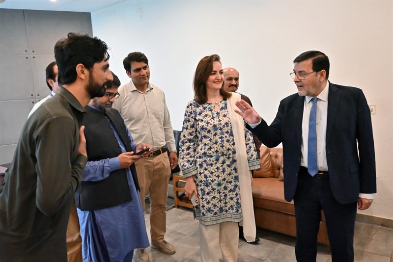 The Director in conversation with students and colleagues