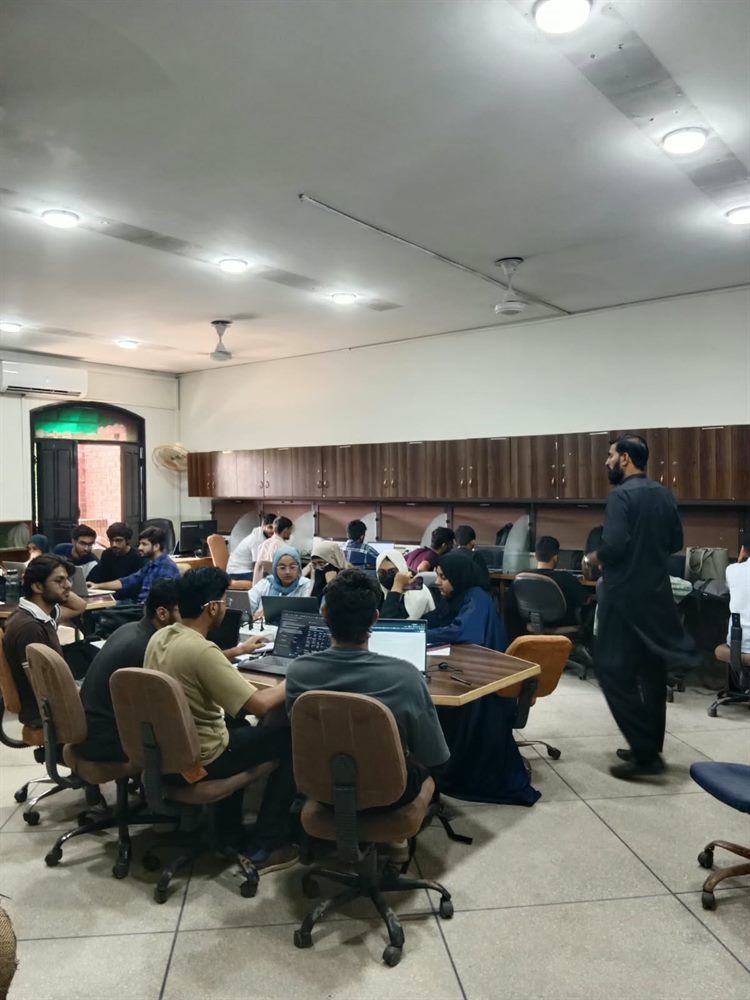 Teams working on their solutions during the hackathon