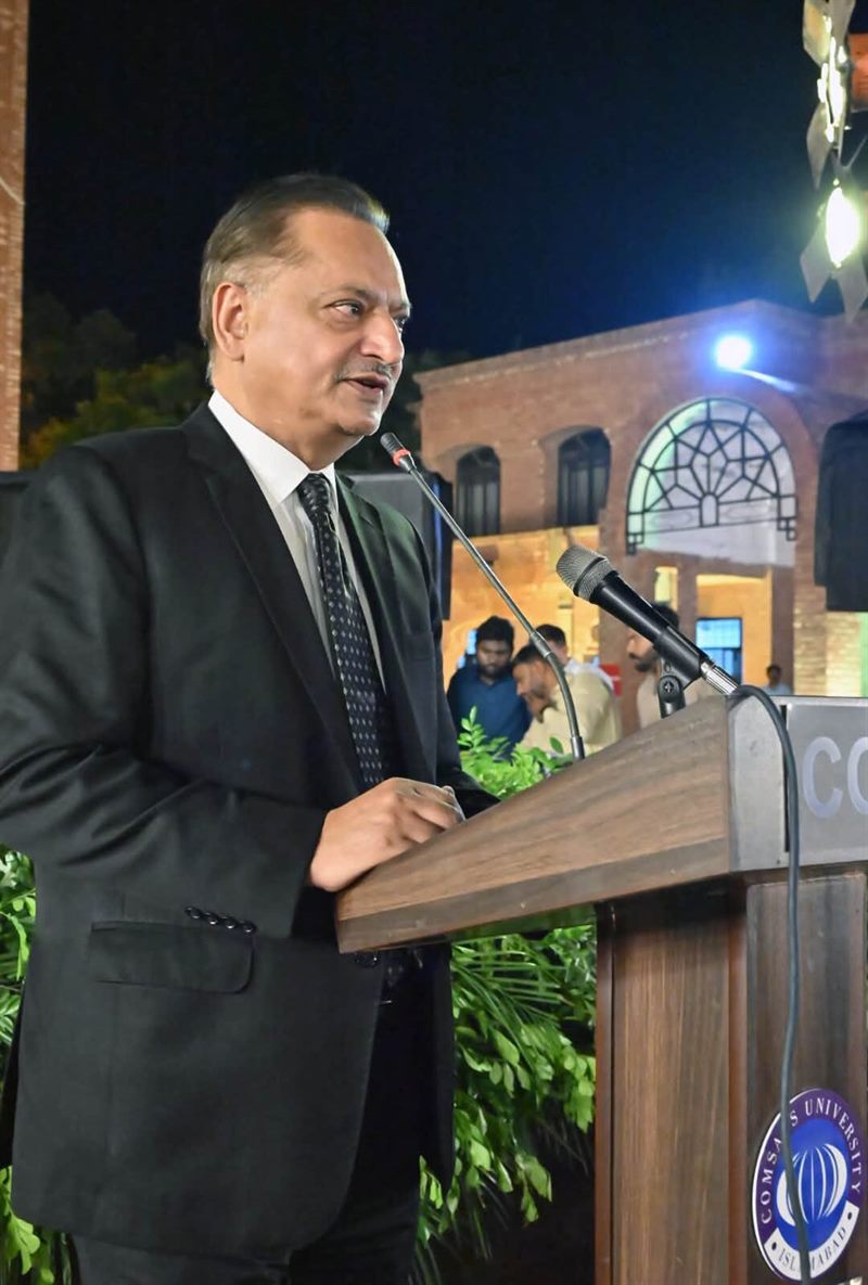 Prof. Dr. Raheel Qamar addressing the gathering from the rostrum