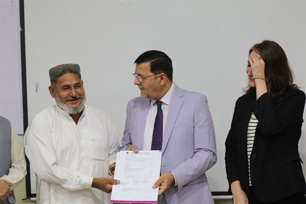 A long-serving colleague receiving his letter