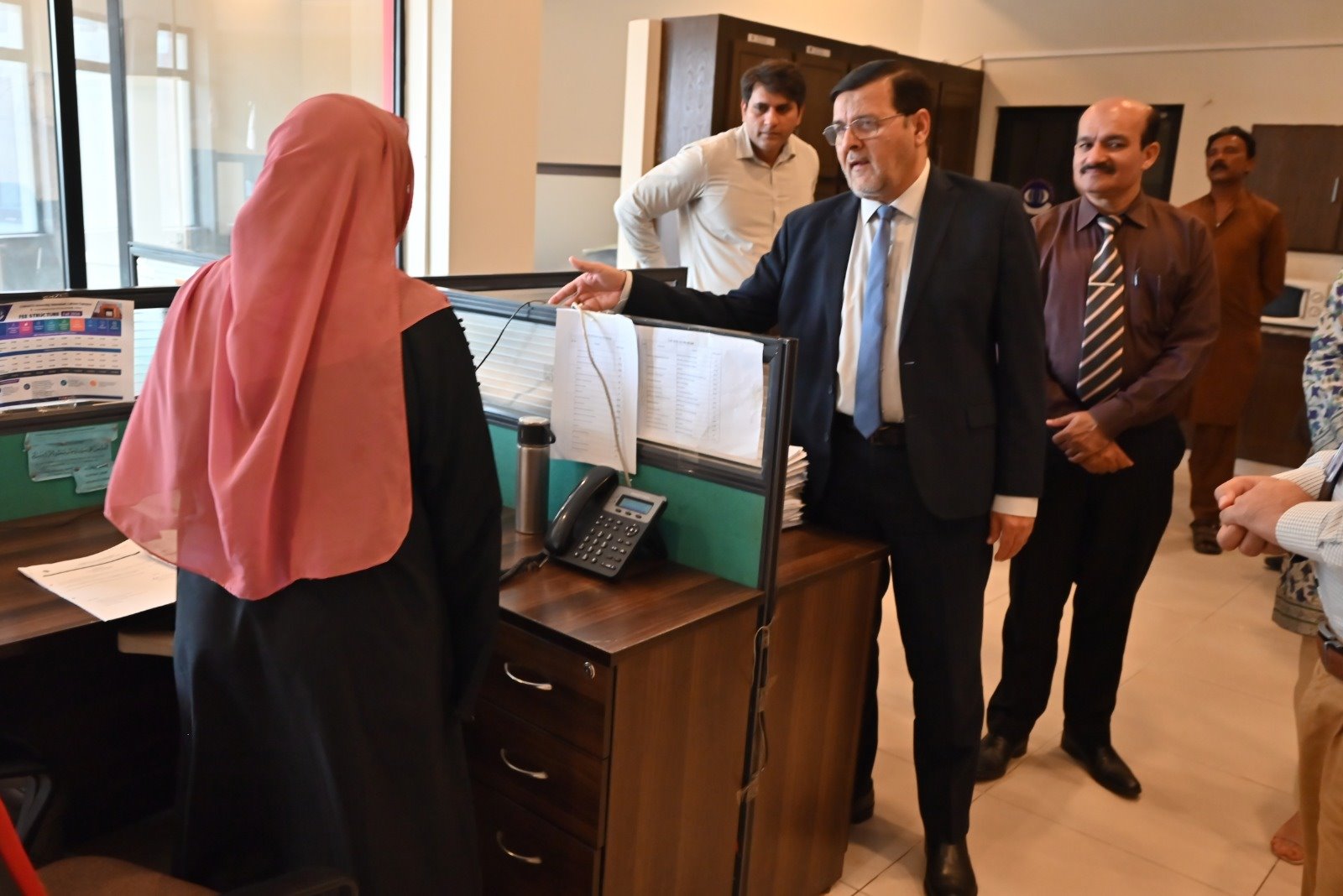 Director Welcomes Visitors and Reviews Student Services