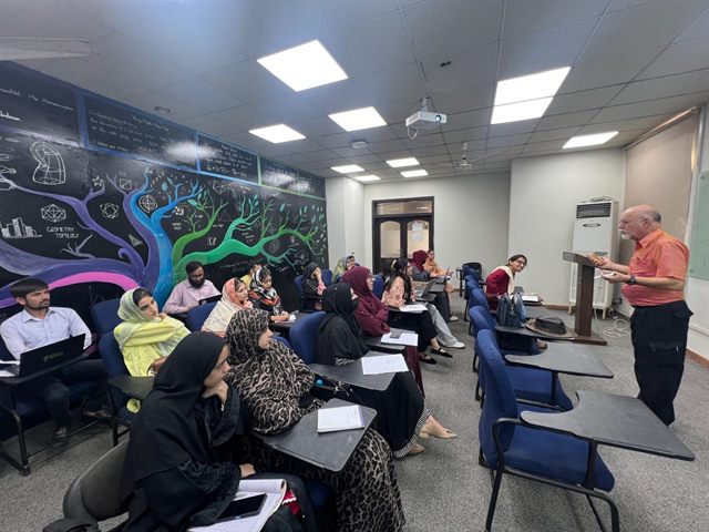Faculty and students attending the lecture