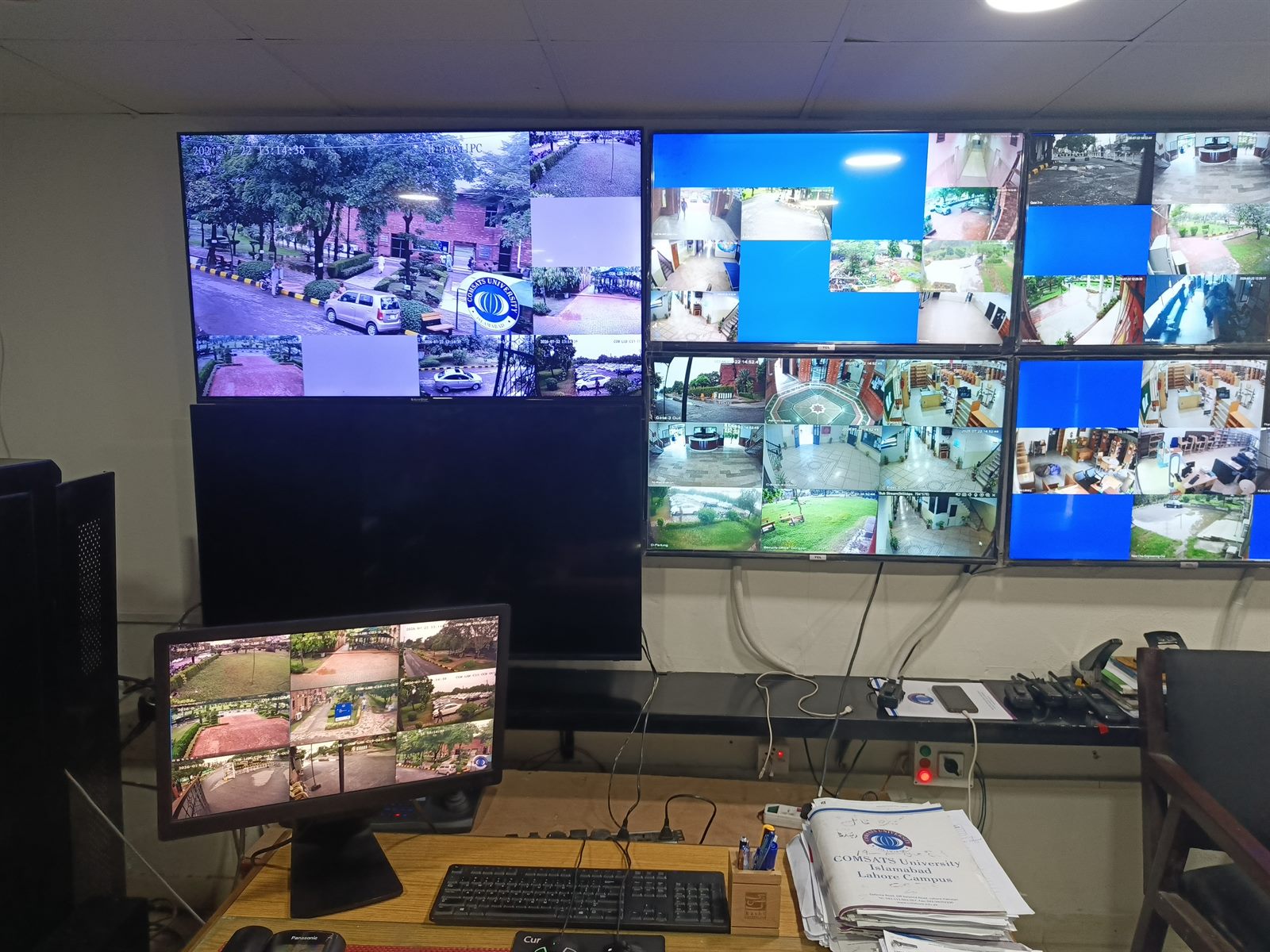 Security Control Room with CCTV video wall and monitoring desk