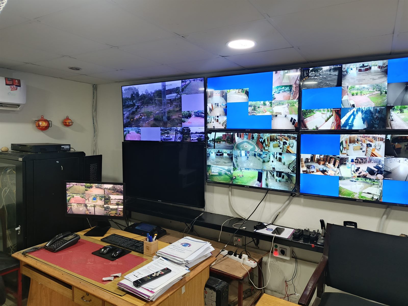 Control room operations desk with wireless communication equipment